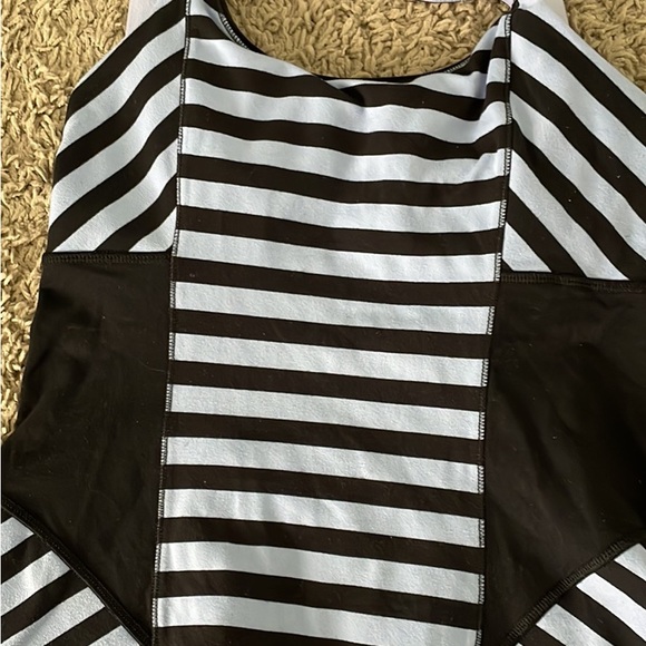 Set of two Lululemon size 4 workout tanks. - Picture 4 of 4